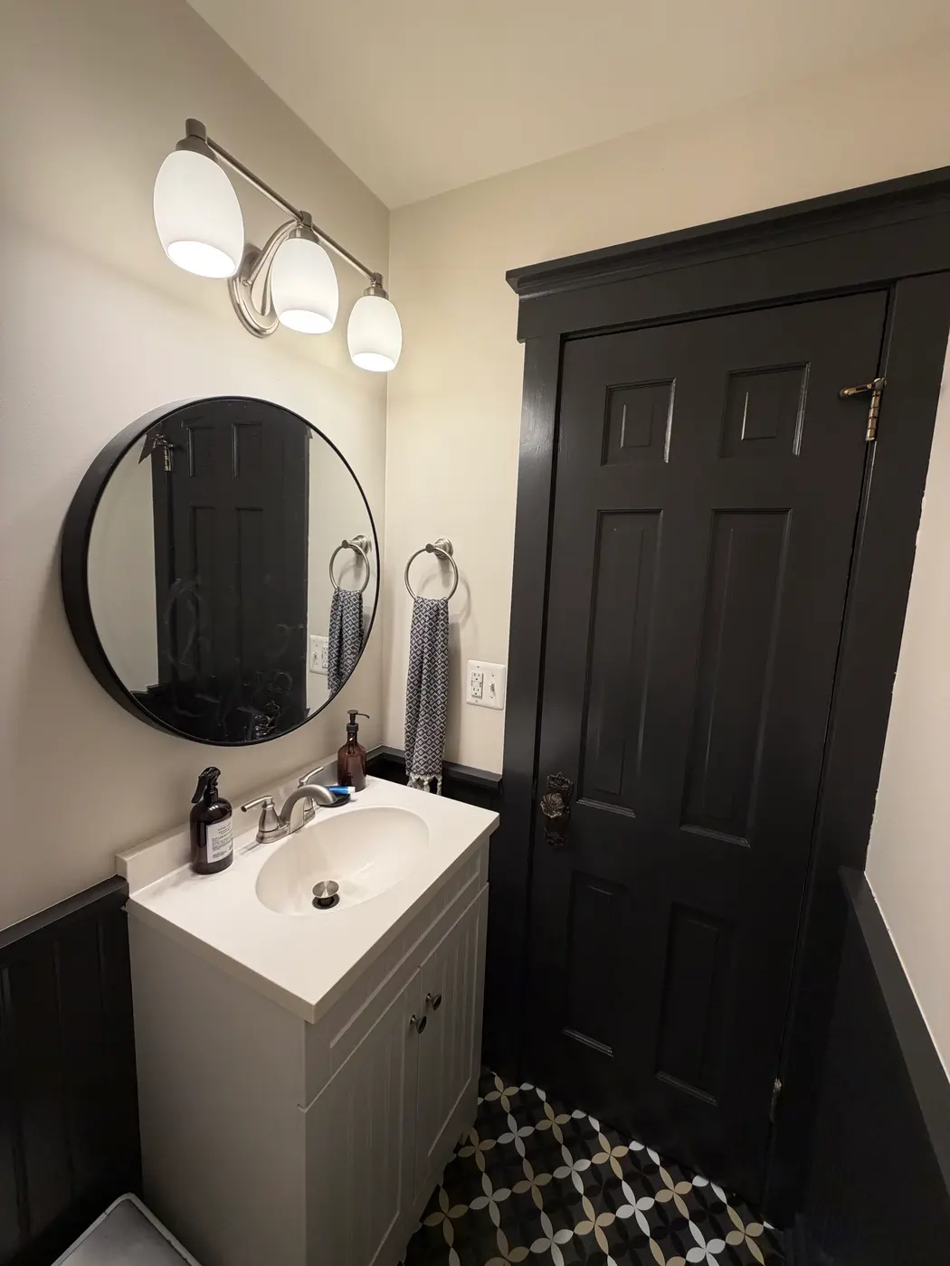Trim, Doors & Baseboards project — Black Door & Crisp White Trim